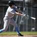 Skyline High School sophomore Brody Stevens makes contact with a ball in the game against Chelsea on Monday, April 22. Skyline won the first game 11-5. Daniel Brenner I AnnArbor.com